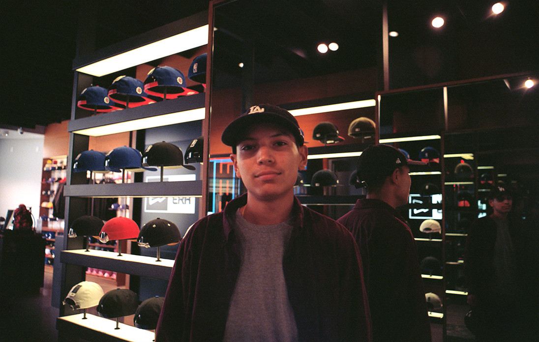 35mm film portrait photographed inside a New Era retail space